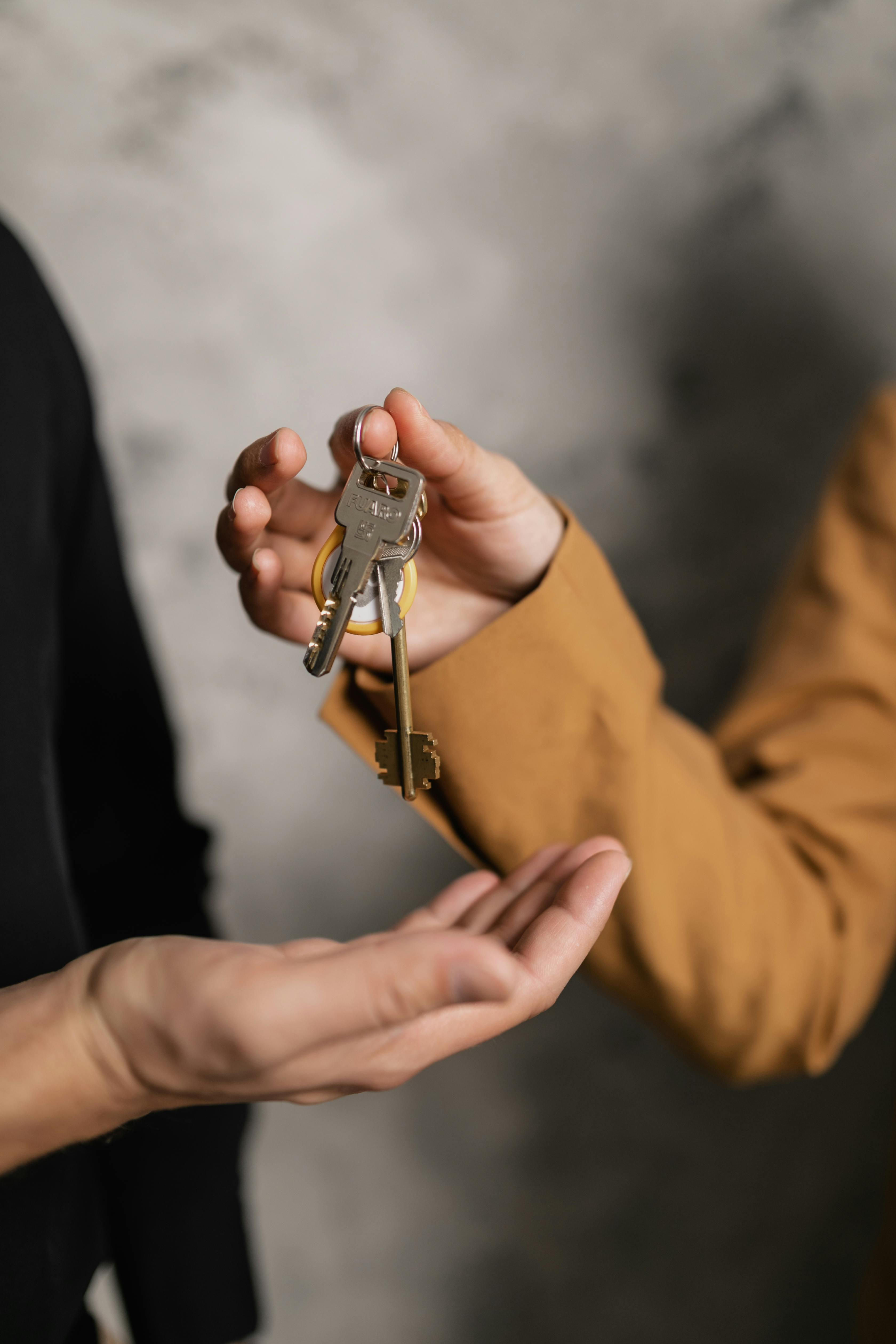 Professional locksmith handing over keys to customer in South San Francisco